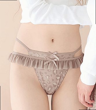 Half-back shorts in a muted brown leopard print with waist cord detailing and tulle frill trim. The half-back (cheeky) cut flatters the hips beautifully, with a stretchy body and lace that fits gently against the skin. Also available in a matching period short, and coordinates with a separately sold men's short.